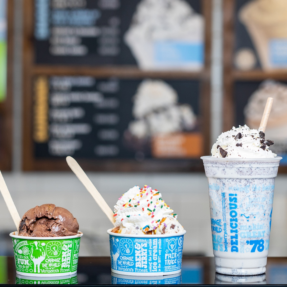 Four scoop shop items sitting on a table