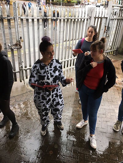 A women in a cow onsie
